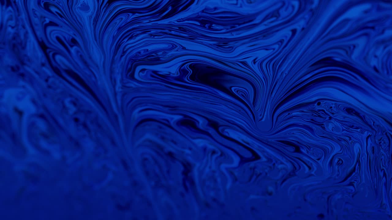 Blue Wavy Streaks and Swirls: Macro Shot from Liquid Soap