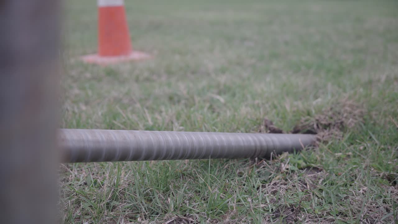 Spinning dig head on a fiber line ditch witch laying cable on a job site