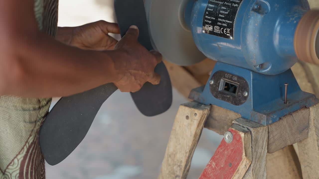 Outdoor carpentry with seasoned craftspersons. Rustic workshop scene showcasing durable woodworking techniques. Skilled worker shaping timber outdoors using traditional tools and steady pressure
