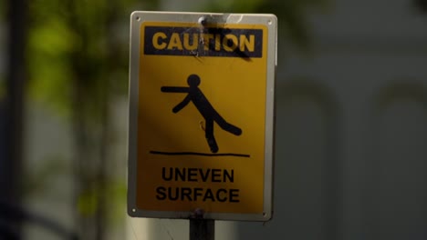 sign of caution uneven surface