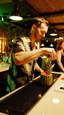 Bartender Preparing Tropical Cocktails at a Nightclub