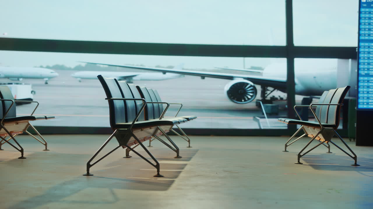 Empty Airport Waiting Area with Airplanes