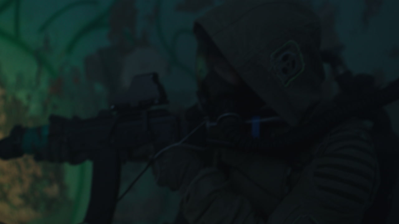 A wounded soldier in the abandoned military complex during the recon mission