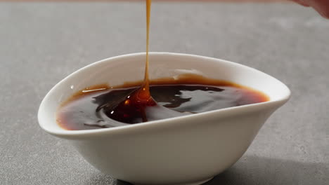 dipping food in sauce