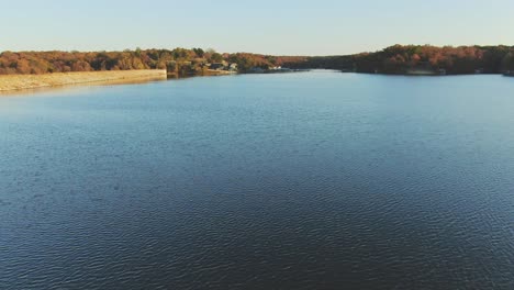 low altitude aerial view of just above lake surface