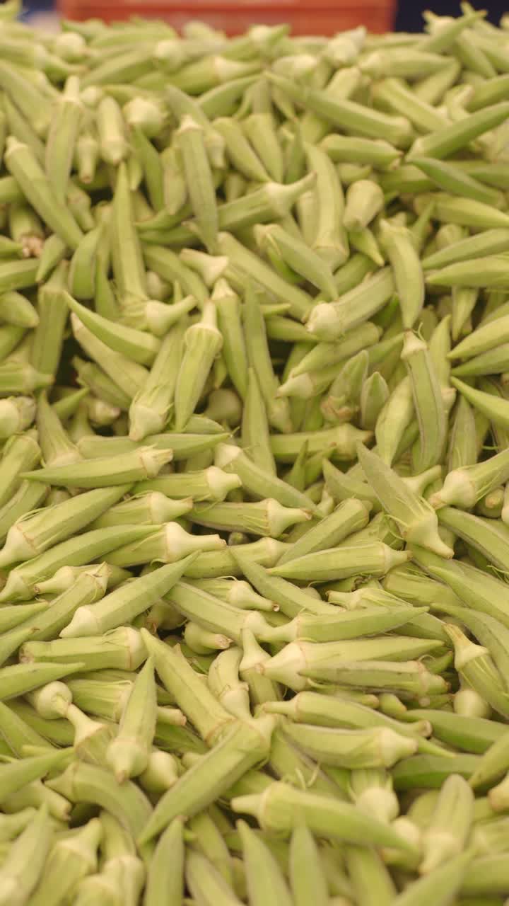 Fresh Green Okra Piled High at a Market
