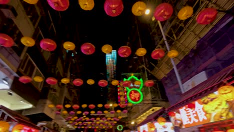 colorful lanterns illuminate bustling market street