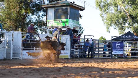 rider competes in a dynamic bull riding event