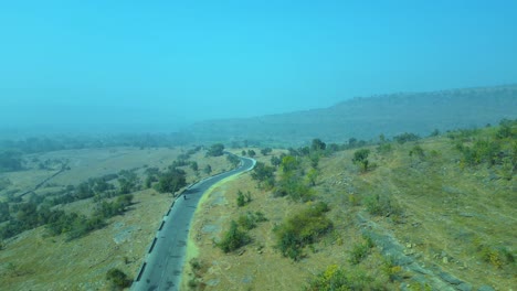 Aerial-view-sctty-Driving-on-Road