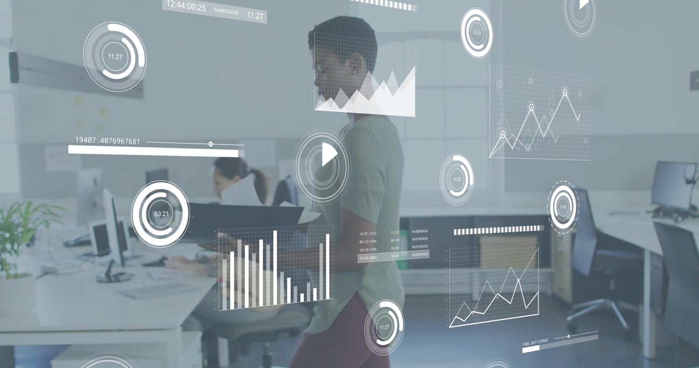 Woman entering from right carrying binder scanning charts with graphs overlaying office