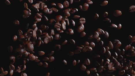 Coffee-beans-tossed-in-air-slow-motion