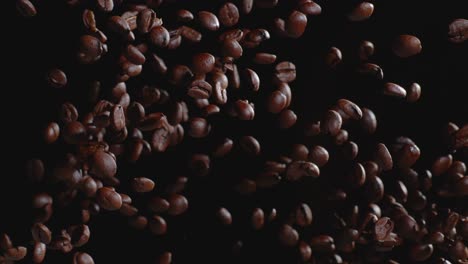 coffee beans tossed in air slow motion