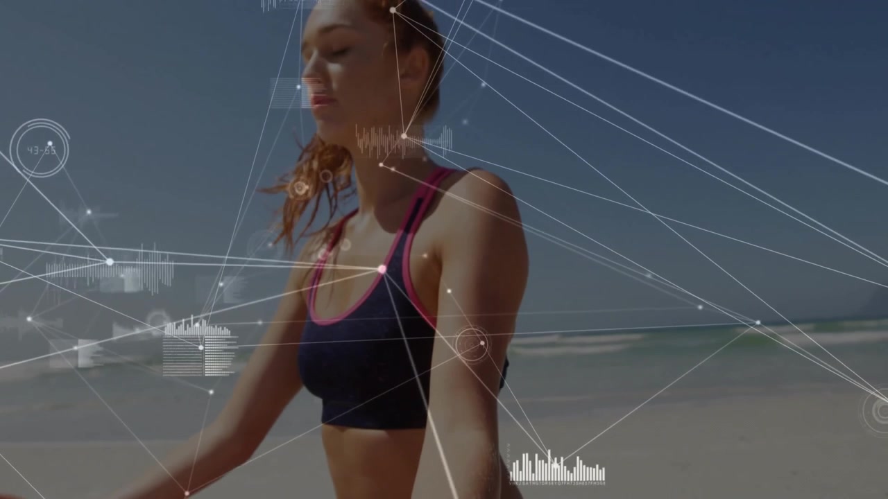 Camera focusing on hands on yoga mat, panning revealing beach meditation showing biometric overlays