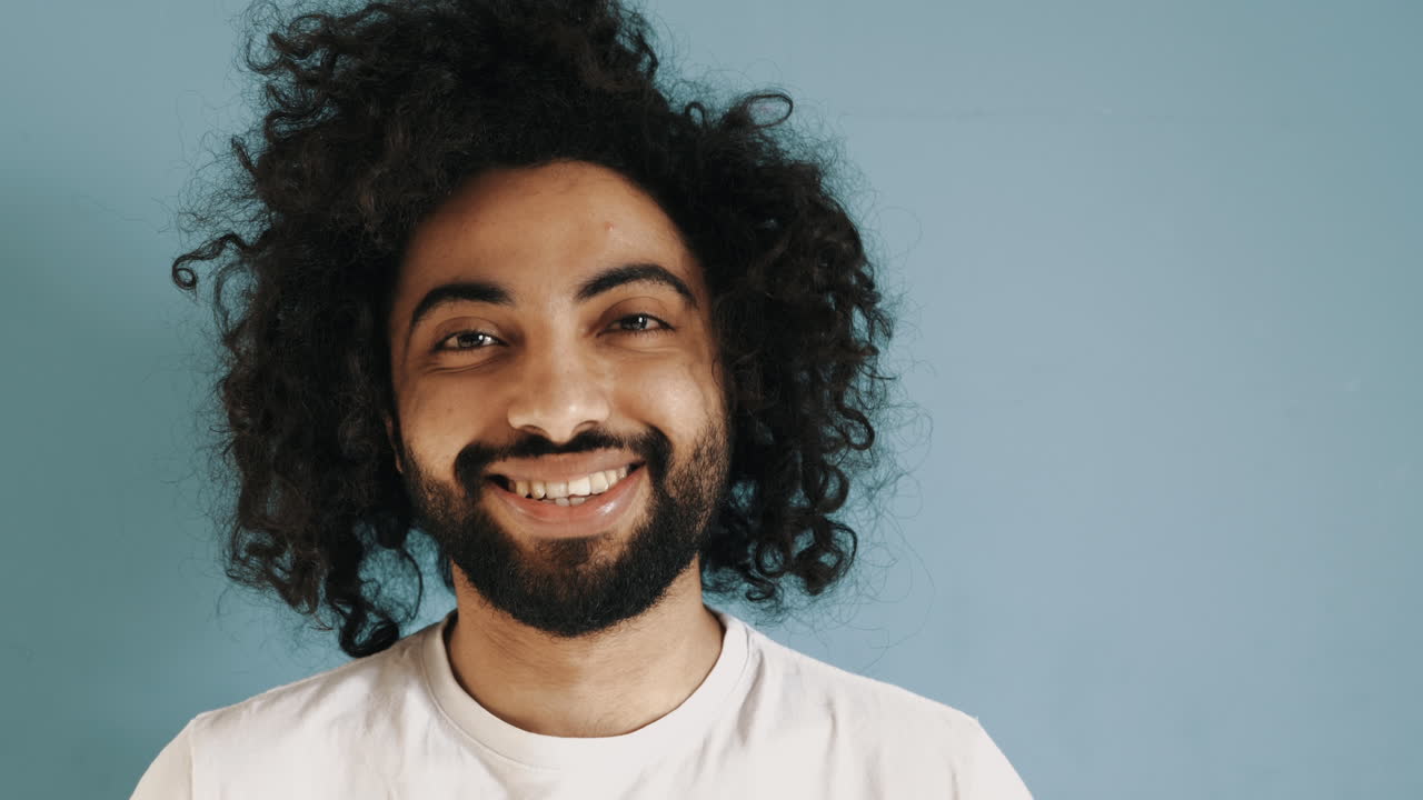 Portrait of a man with curly hair