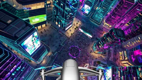 drone's eye view of a futuristic city at night