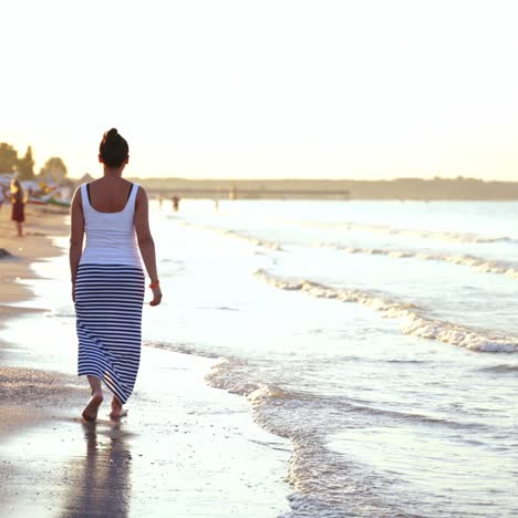 woman walking on the seashore