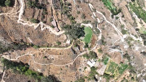 Top--down-aerial-shot-of-incredible-landscapes-of-Matucana-in-Peru