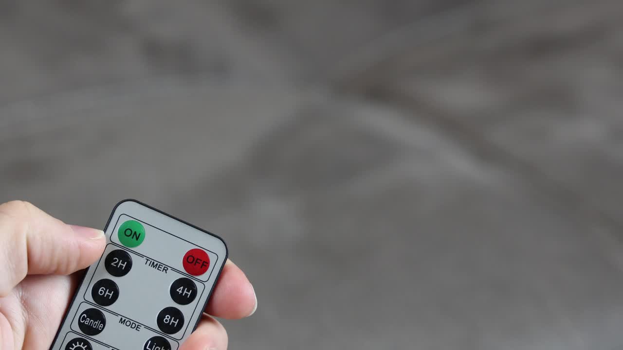 Pressing on button on remote control, isolated establisher