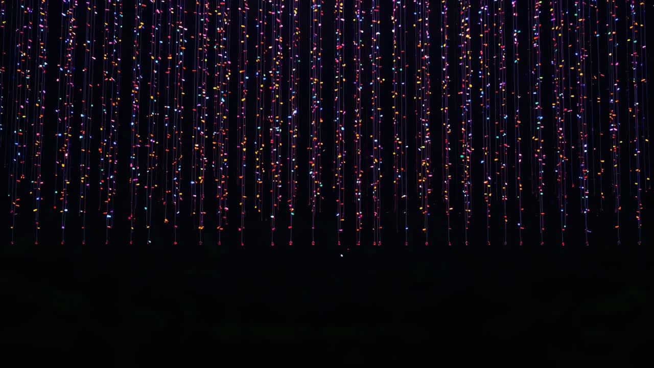 Starting program animating dense LED light curtain at gallery, with cascading multicolor nodes