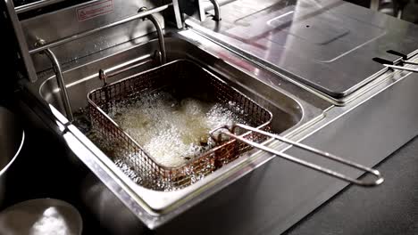 commercial deep fryer in use