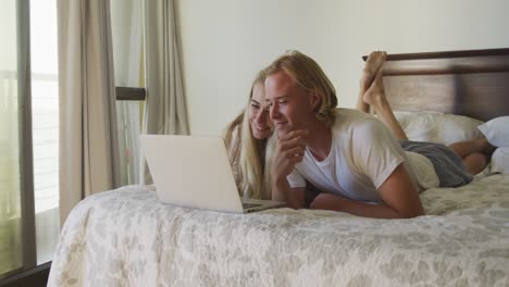 caucasian couple self isolating at home during coronavirus covid19 pandemic