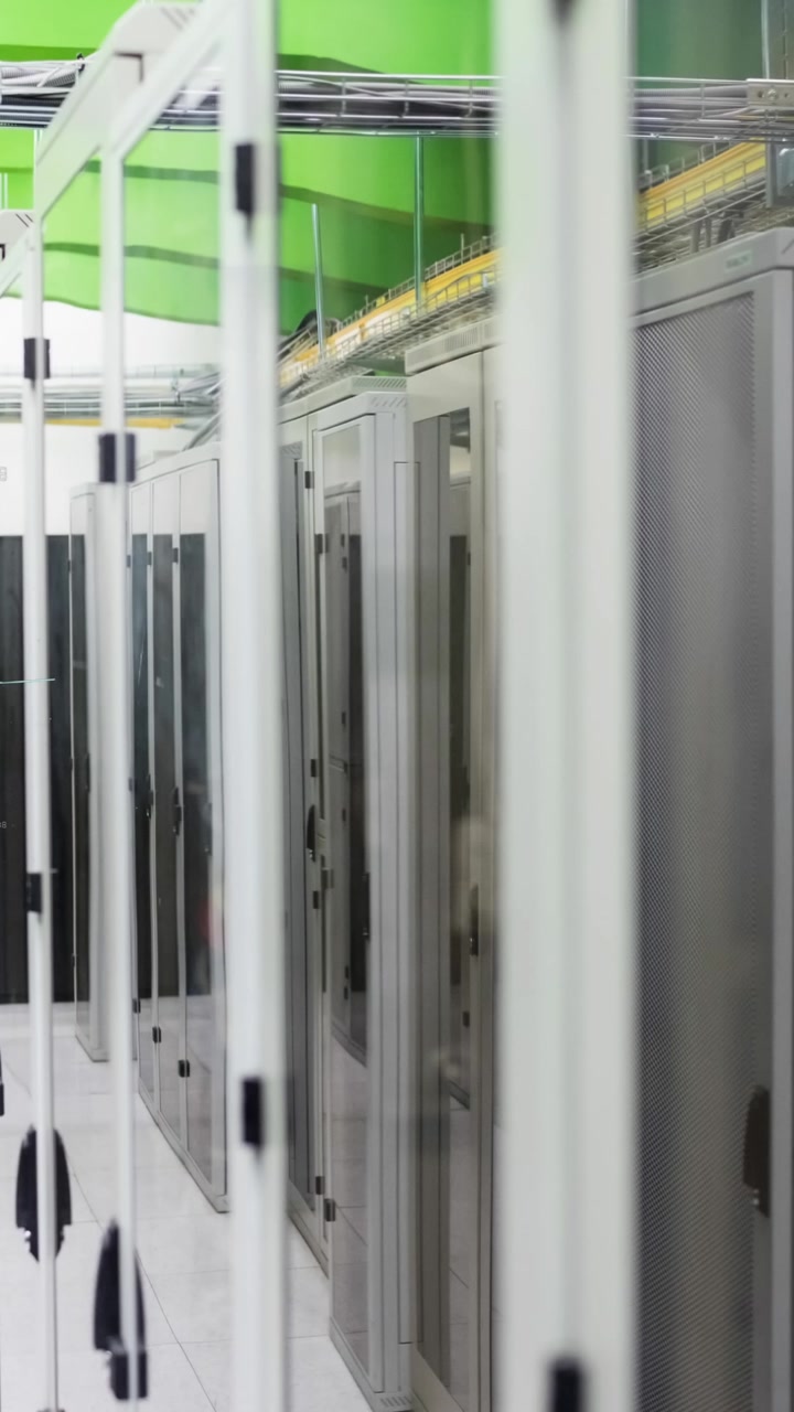Digital composite of a man in a server room 4k