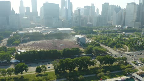 aerial pullback from lollapalooza crowds - commercial use