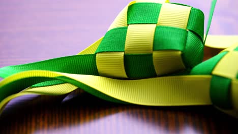 ribbon ketupat on the wooden table