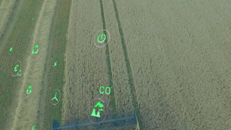 combine harvester header cutting through wheat field, showing energy co2 icons in flat design