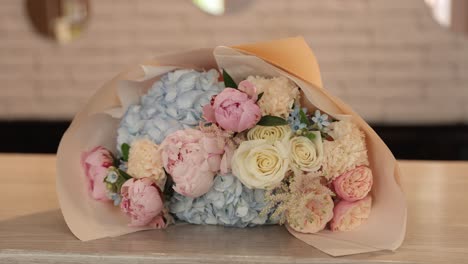 a beautiful mixed flower bouquet featuring soft pastel colors perfect for any occasion this stunning bouquet features a mix of pink blue and white flowers perfect for any occasion or celebration