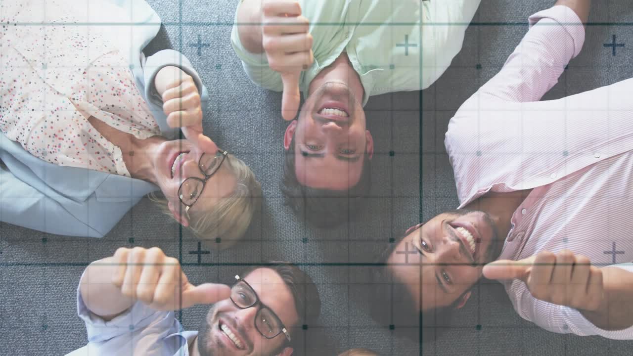 Overhead camera rolling business team giving thumbs-up on carpet while grid aligning, promoting