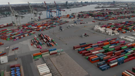 Forklifts-driving-around-cargo-container-terminal-in-Hamburg-port