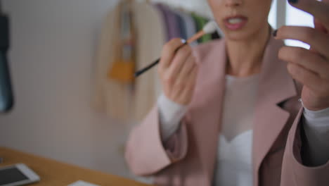 blogger hand showing brush talking at house online closeup. woman recording blog