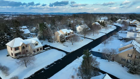 american suburban homes in winter snow