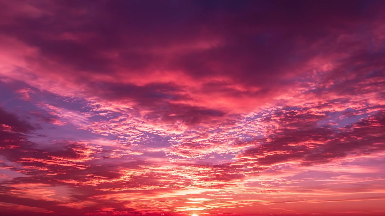 Beautiful purple and orange sunset sky with colorful clouds