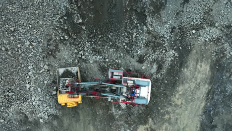 aerial view of mining equipment in quarry