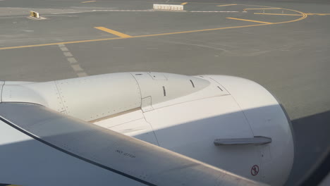 airplane engine and wing view from window