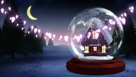 Animation-of-snow-globe-and-lights-over-winter-landscape