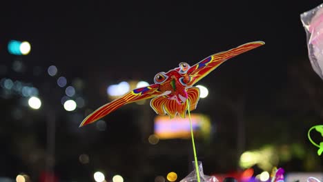 colorful fish toy in motion at night