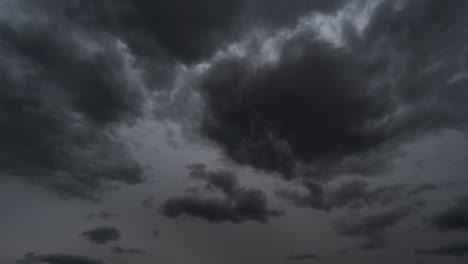 background of dark dramatic sky with stormy clouds timelapse before rain or snow, extreme weather