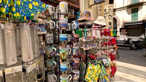 colorful souvenirs displayed in a naples street shop