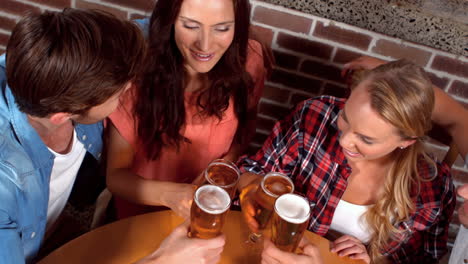 happy friends having a drink together