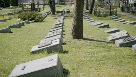 graveyard with tombstones in an urban area on a sunny day 2