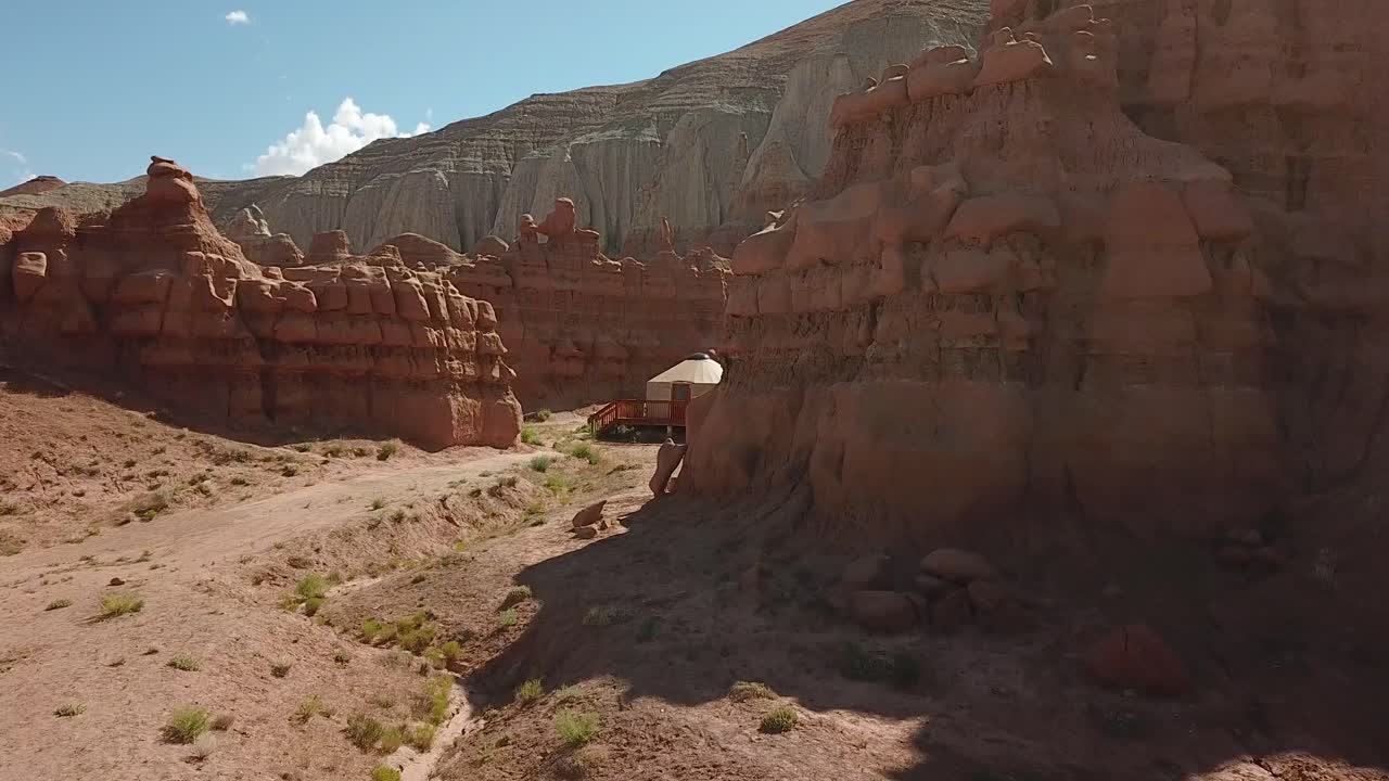Yurt in a Desert Canyon with Rock Formations