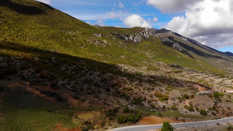 High-mountain-with-green-forests-and-rocky-slopes-on-natural-park-of-Prespa-in-Albania