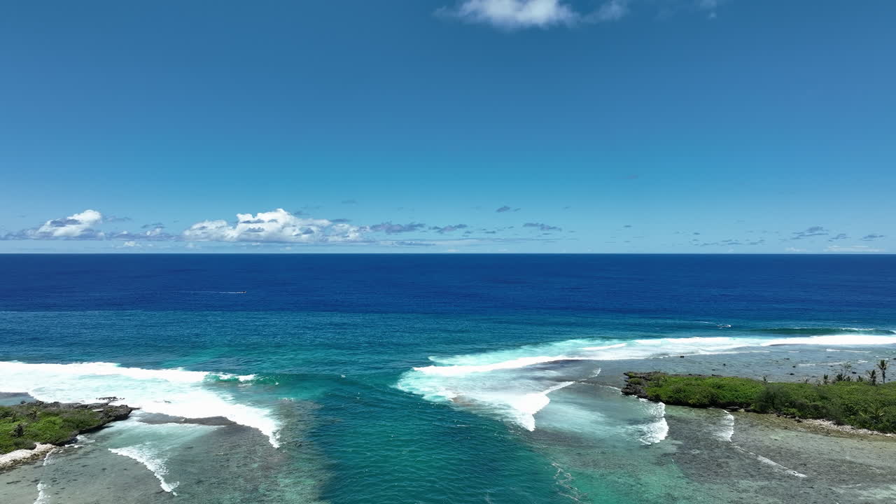 Aerial high angle dolly Avana Passage harbor in Rarotonga Cook Islands by Garden of Seven Stones