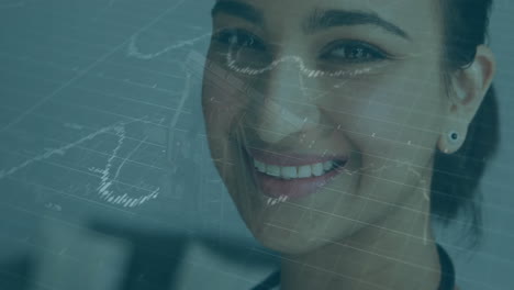 female doctor smiling close up in clinic, showing financial charts and candlestick graphs