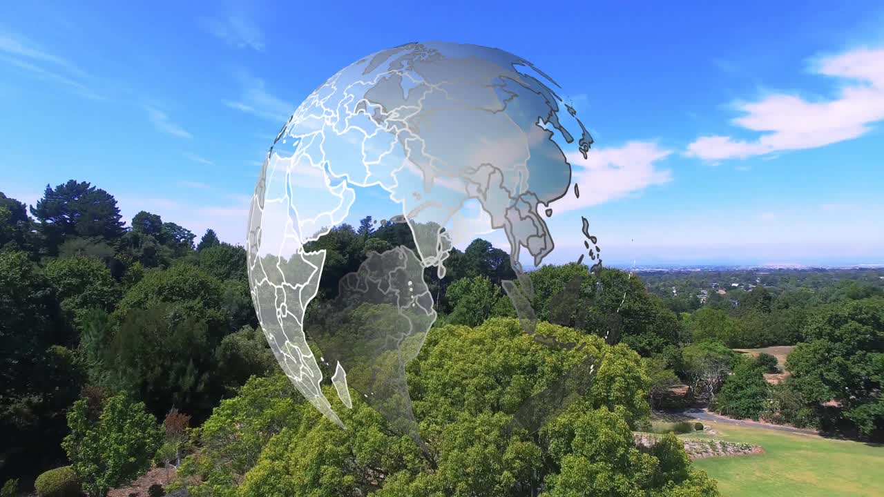 All'inizio della clip, un globo traslucido si materializza sopra un parco, ruotando e rivelando i contorni dei continenti.