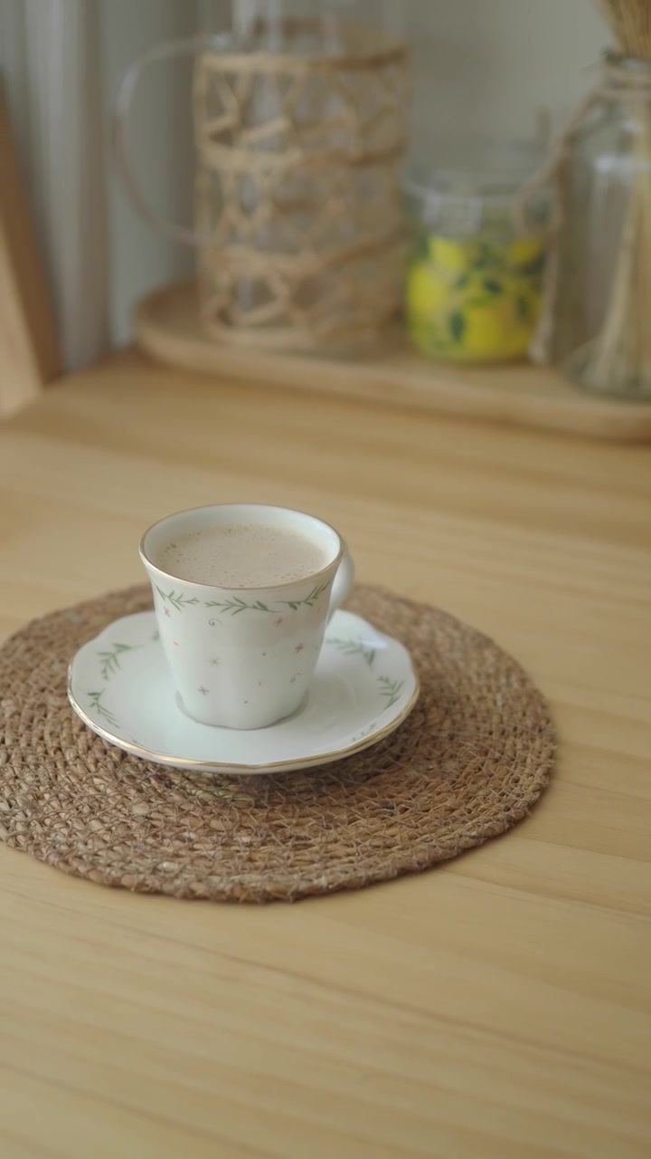 A Cup of Coffee on a Wooden Table