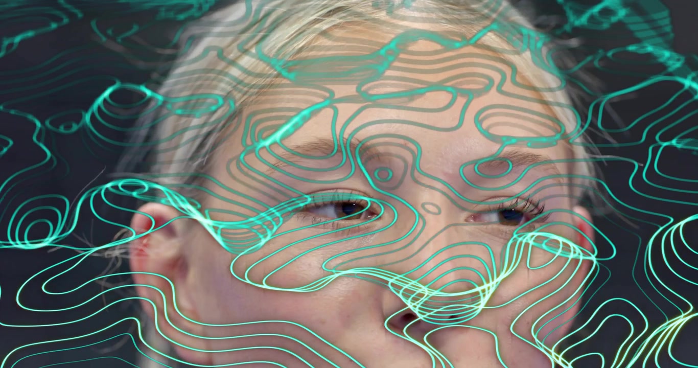 model maintaining expression upon start while green contours emerging for facial mapping tech demo